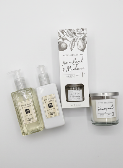 Collection of beauty products including bottles and a box on a light gray background